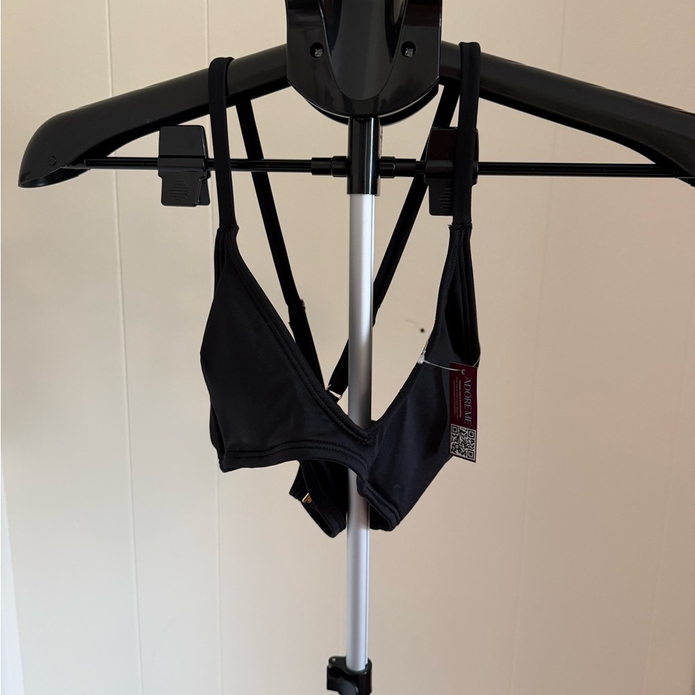 New with tags Adore me asymmetric bikini top, size xs.